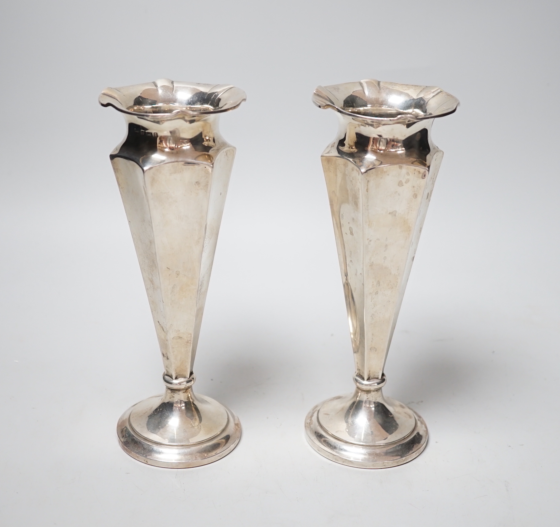 A pair of George V silver mounted spill vases, Deakin & Francis, Birmingham, 1910, height 20.4cm, weighted.